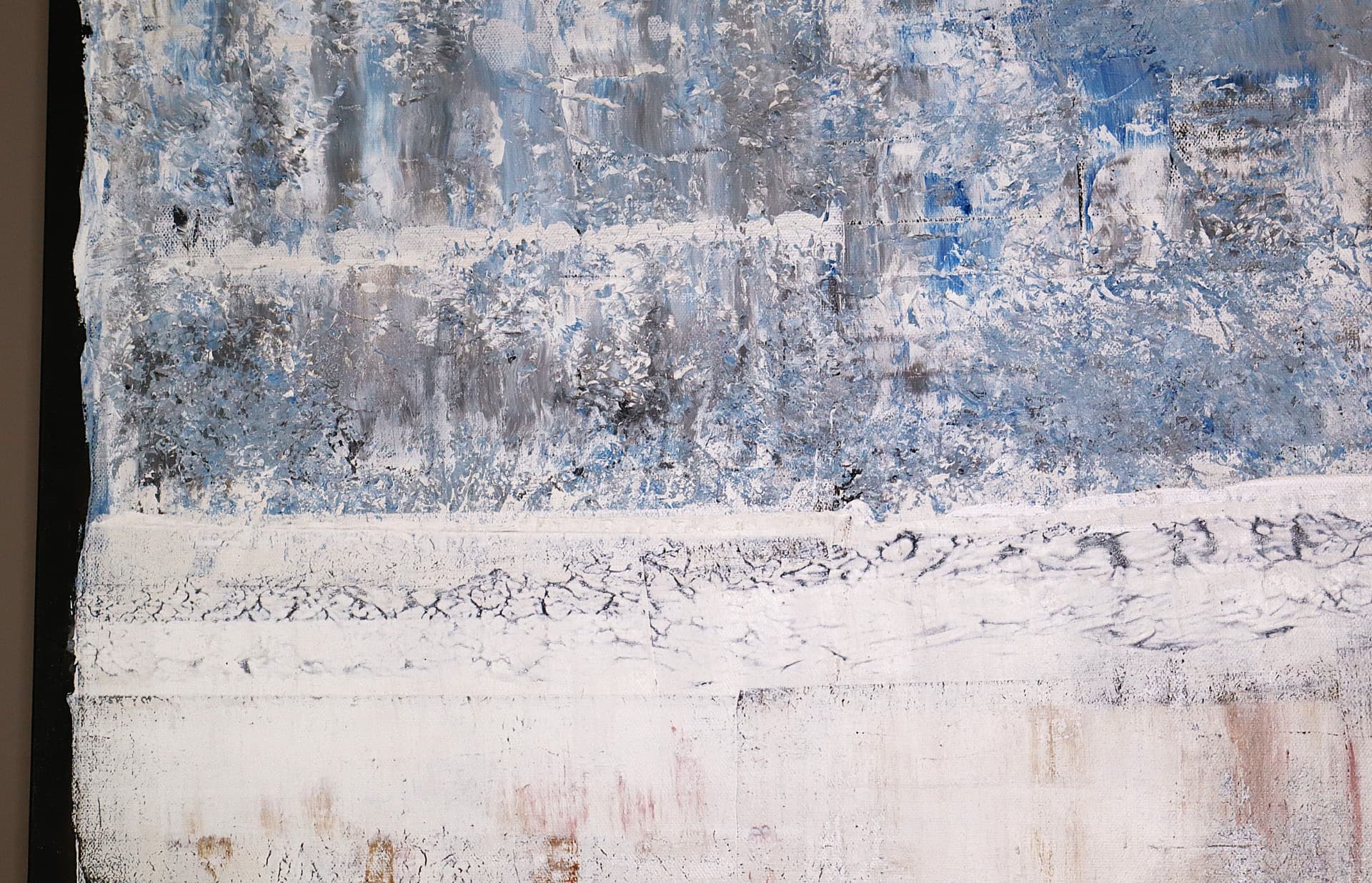 Autumn — close-up detail of cracked white and warm ochre passages below a cool blue-gray field