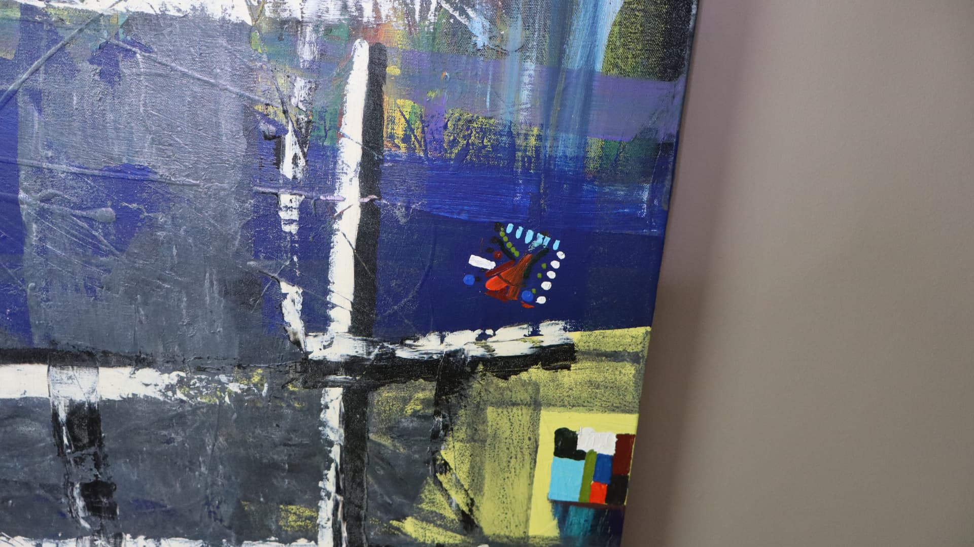 Laws — close-up detail of black grid, cobalt planes, and small red, yellow, and blue marks