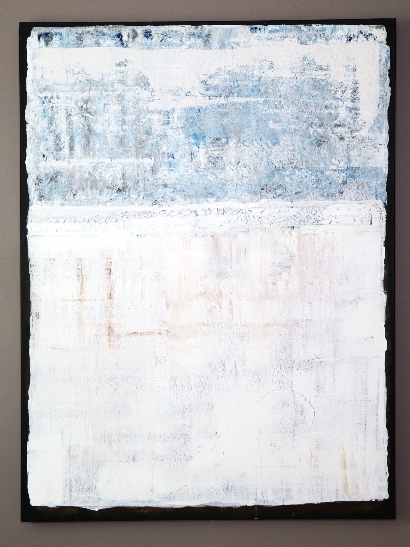 The Seasons — Autumn: pale blue sky over a sage field flecked with rust
